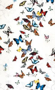 A LARGE WALL ART PIECE OF AN ARRAY OF COLORFUL BUTTERFLIES TO BRIGHTEN YOUR SPACE 